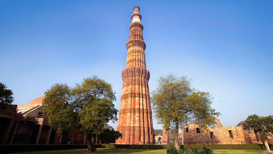 The red sandstone tower of Qutub Minar in Delhi
