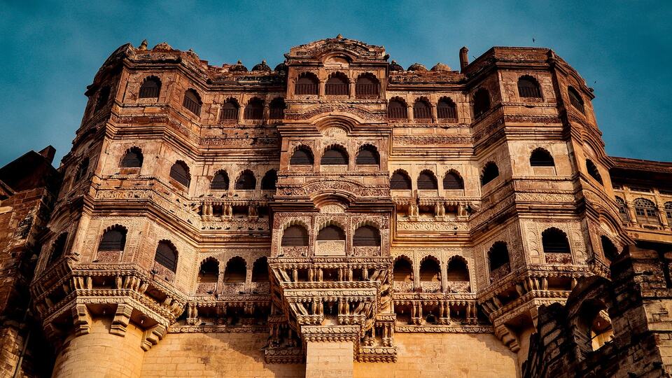 Carved sandstone palace facades of Mehrangarh Fort in Jodhpur