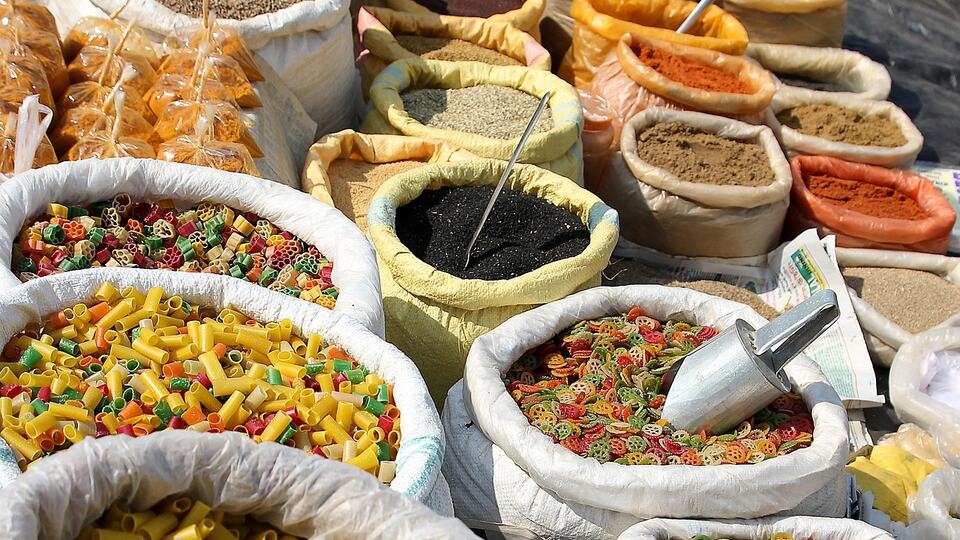 Bowls of colourful Indian spices such as turmeric, chilli and coriander