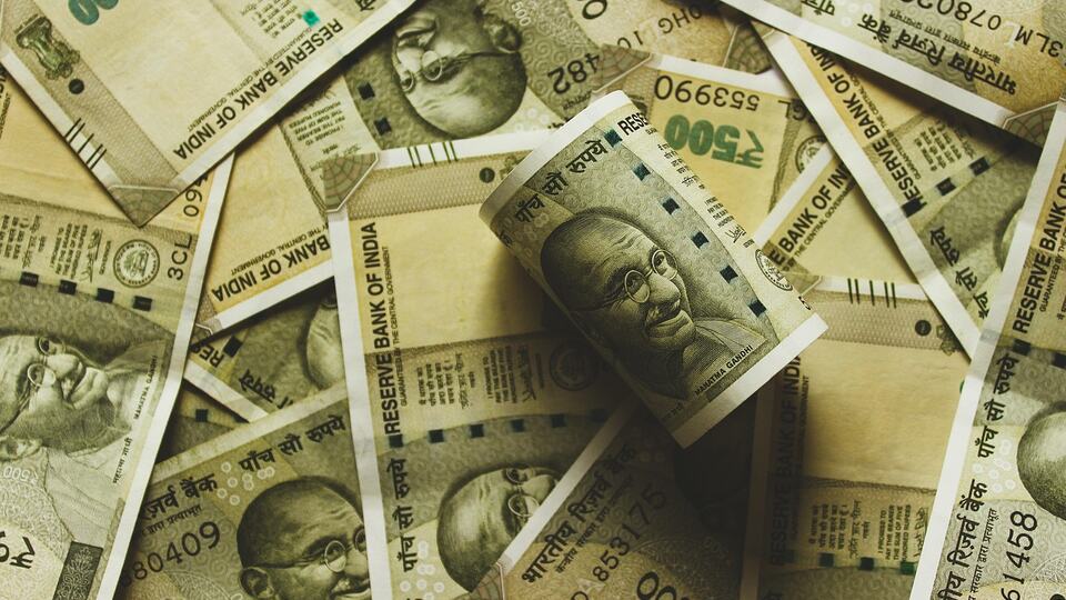 Indian rupee banknotes used to pay for a trip to India
