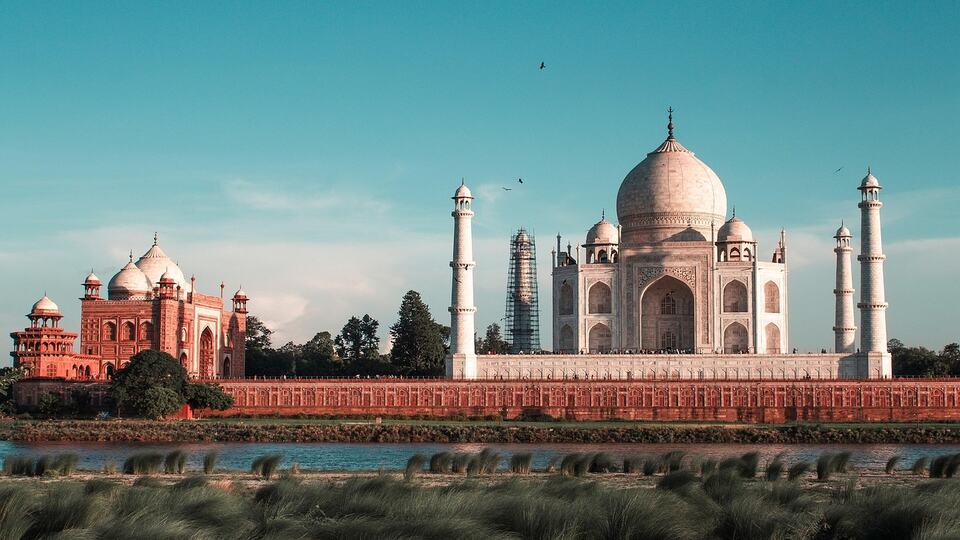 The Taj Mahal seen across the Yamuna River from the Mehtab Bagh gardens in Agra