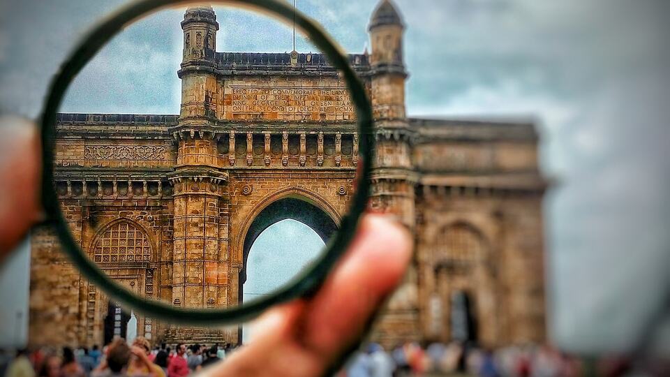 The Gateway of India in Mumbai seen through a hand-held lens