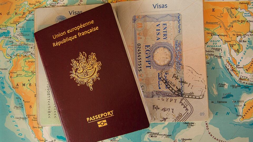 Passport with a visa page and a stamp, ready for travel to India