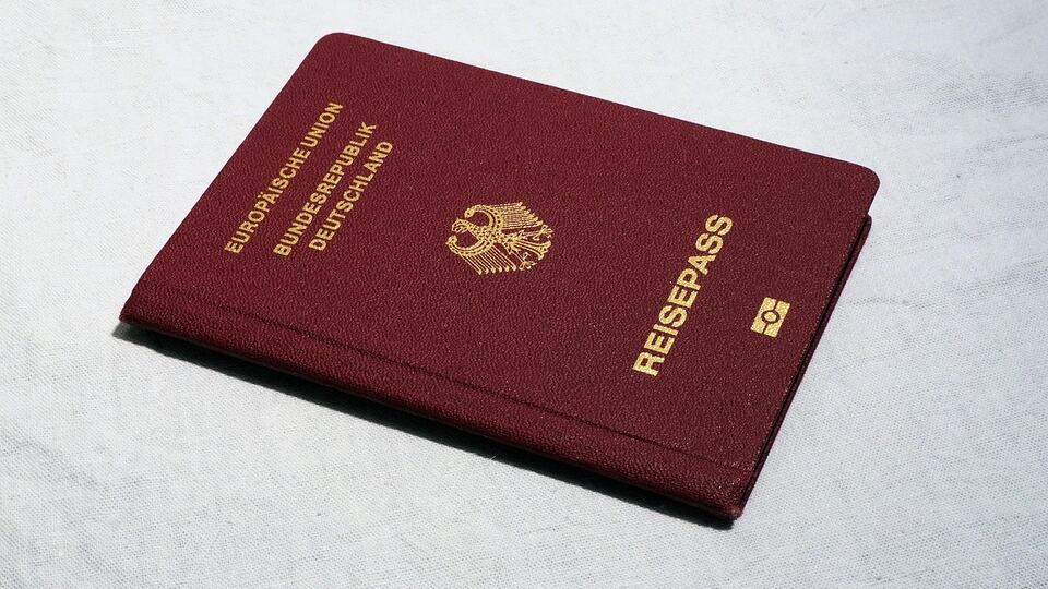 Passport and travel documents laid out on a table before a trip to India