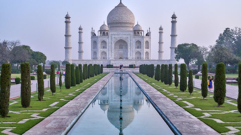 The Taj Mahal in Agra seen from its Mughal gardens on a Golden Triangle tour