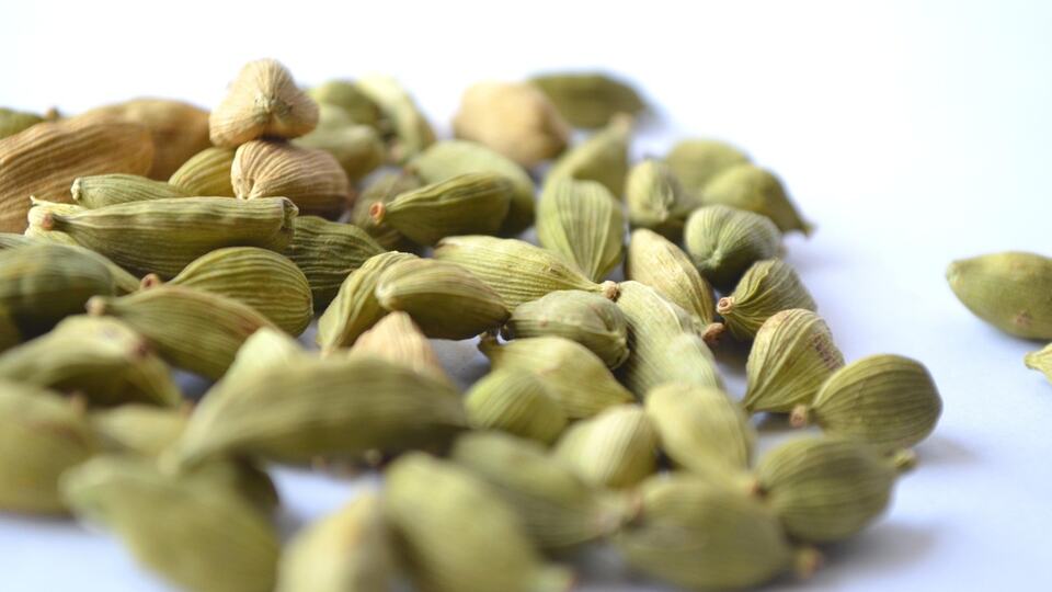 Green cardamom pods, one of the spices used in Indian cooking