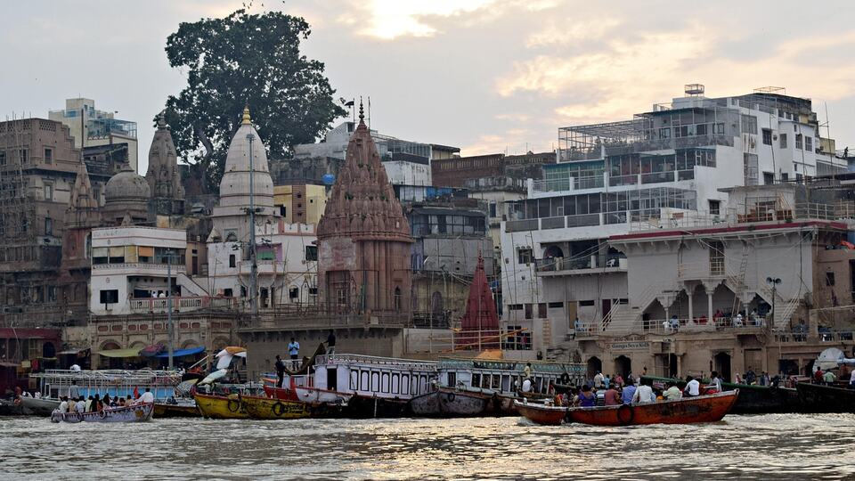 Temples and ghats of Varanasi seen from a boat on the Ganges