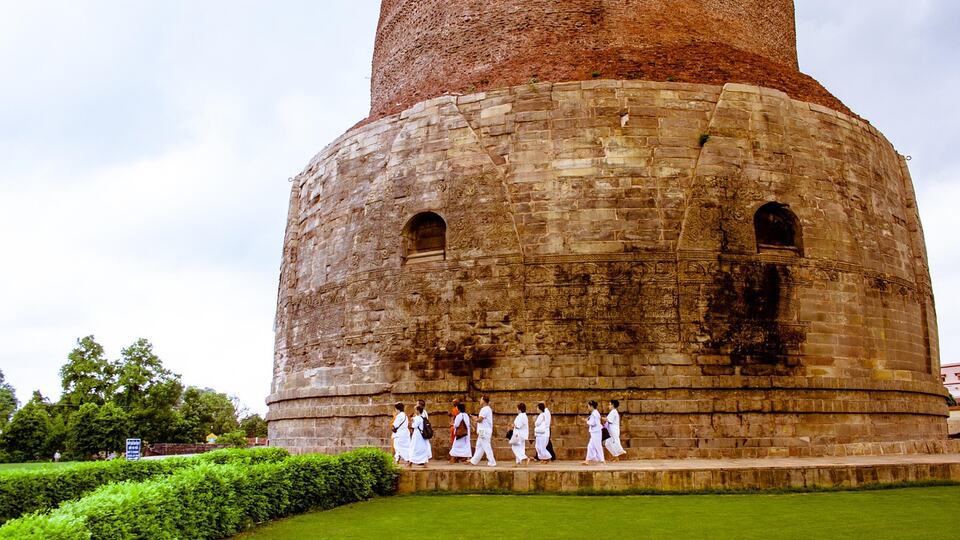 Buddhist pilgrims at the Dhamek Stupa in Sarnath